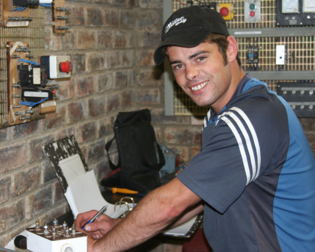 RTC learner preparing to wire dual-speed rotary switch panel
